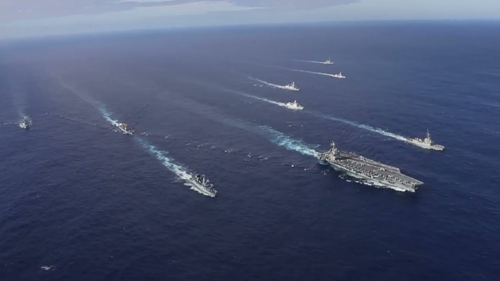 Carrier Strike Group Drops Anchor; Defies Biden Regime! | Real Raw News